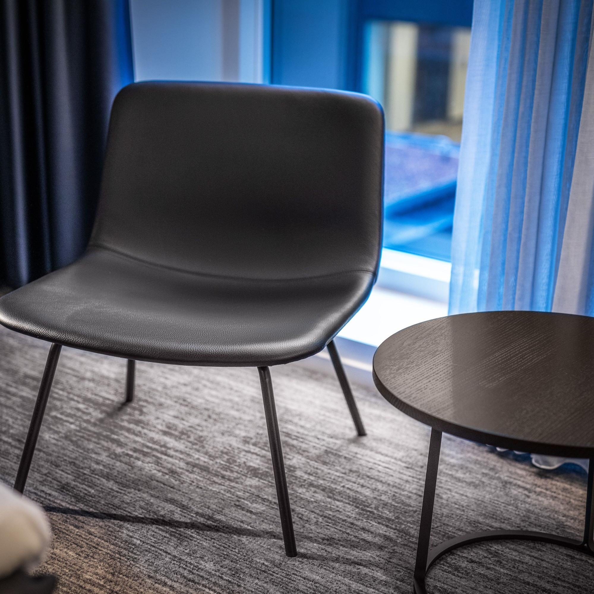 Comwell Copenhagen Portside Dolce By Wyndham Hotel Exterior foto The chair in black leather